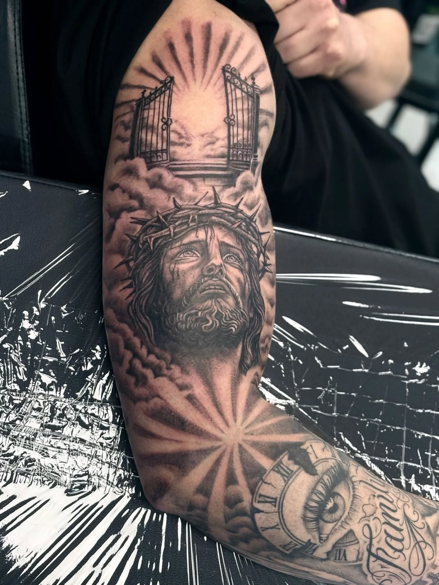 Jesus portrait tattoo sleeve
